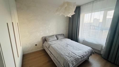 Postel nebo postele na pokoji v ubytování Guest Appartment
