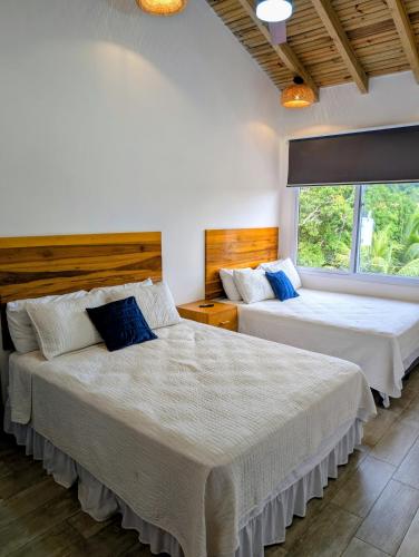 Postel nebo postele na pokoji v ubytování Condominios Acondicionados Postomare