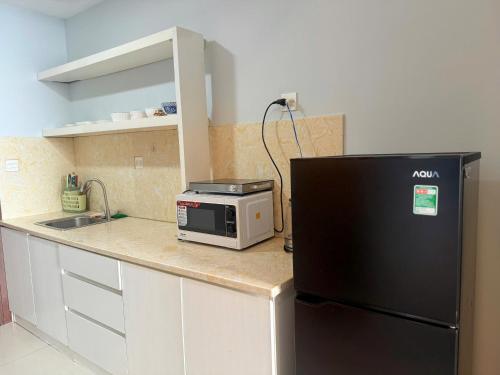 Kuchyň nebo kuchyňský kout v ubytování Citizen apartment - rivergate