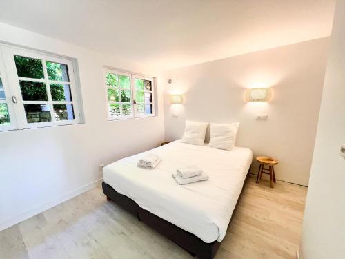 Ένα ή περισσότερα κρεβάτια σε δωμάτιο στο Dreamy holiday home with garden