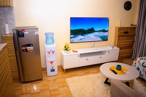 Η κουζίνα ή μικρή κουζίνα στο Iplus Penthouse, Ngoingwa Estate, Thika