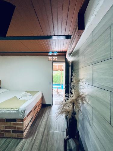 Ένα ή περισσότερα κρεβάτια σε δωμάτιο στο Hotel Kapla