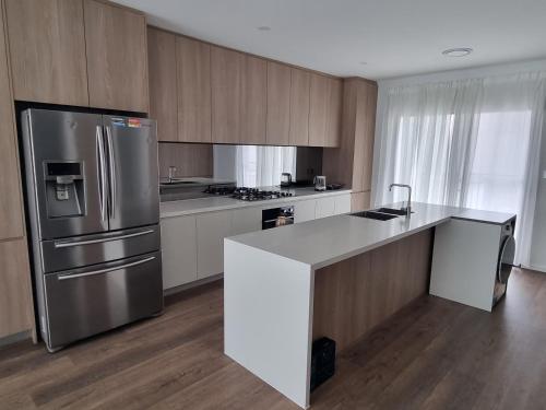 Η κουζίνα ή μικρή κουζίνα στο Box hill townhouse