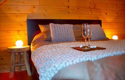 En eller flere senge i et værelse på Chalet Montana - hot tub, sauna, playstation