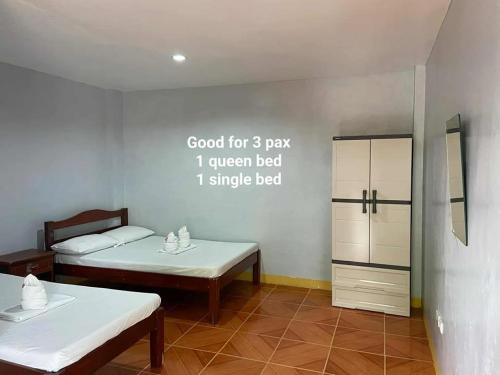 Postel nebo postele na pokoji v ubytování Onde's Guest House