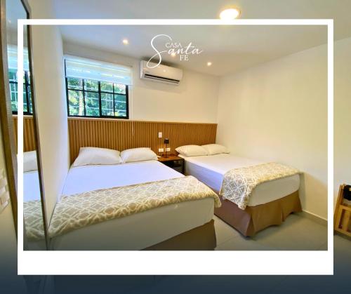 Postel nebo postele na pokoji v ubytování Casa Santa Fe