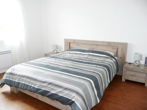 Ένα ή περισσότερα κρεβάτια σε δωμάτιο στο Apartment in Lilia near Kastell Ac"h Strand