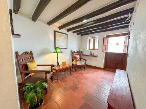 Χώρος καθιστικού στο Casa Raíz Apartahotel en Villa de Leyva