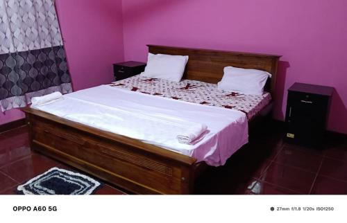 Postel nebo postele na pokoji v ubytování Sunbeam Family Resturant