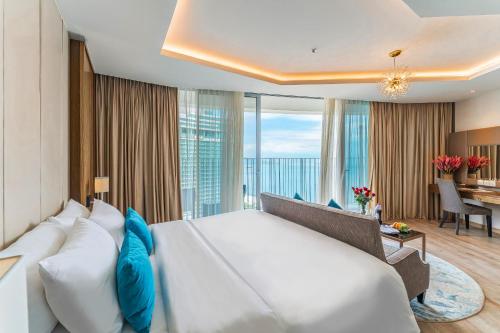 Ένα ή περισσότερα κρεβάτια σε δωμάτιο στο INFINITY OCEAN PALACE PANORAMA Nha Trang Center