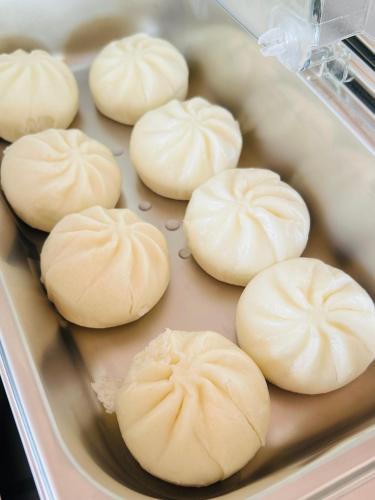 a tray filled with uncooked butter cookies with frosting at Umi Resort 菩提有米 in Sihanoukville