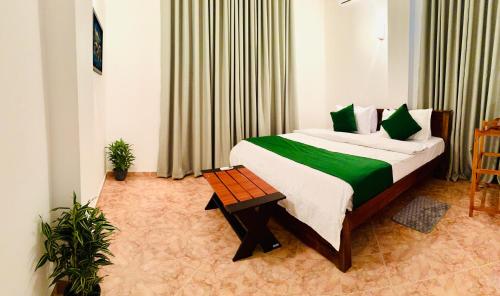 Ένα ή περισσότερα κρεβάτια σε δωμάτιο στο Kandy Villa 119