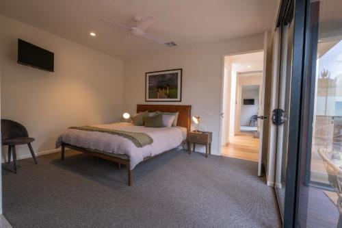 A bed or beds in a room at Waldhütte your enchanting forest retreat!