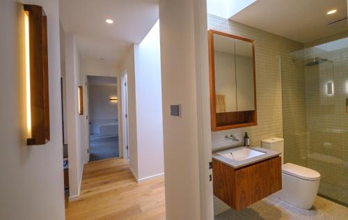 A bathroom at Waldhütte your enchanting forest retreat!