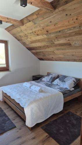 Postel nebo postele na pokoji v ubytování Relaks Nad Potokiem