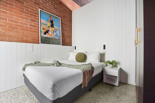 Ένα ή περισσότερα κρεβάτια σε δωμάτιο στο The Milliner on Elizabeth