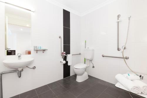Koupelna v ubytování Hotel Chino