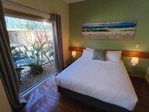 Postel nebo postele na pokoji v ubytování The Original Bel-Air Motel