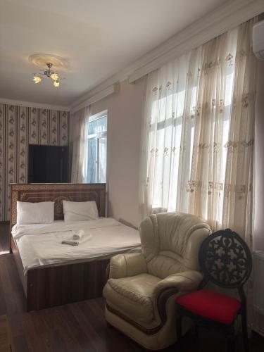 Ένα ή περισσότερα κρεβάτια σε δωμάτιο στο Baku Palace 1912