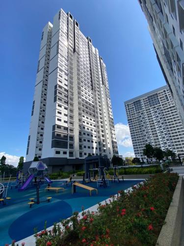 a large building with a playground in front of it at Traders park Balakong 3 room Wi-Fi balcony unblock view in Cheras