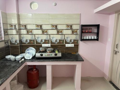 Kuchyň nebo kuchyňský kout v ubytování CC Elite Homestay