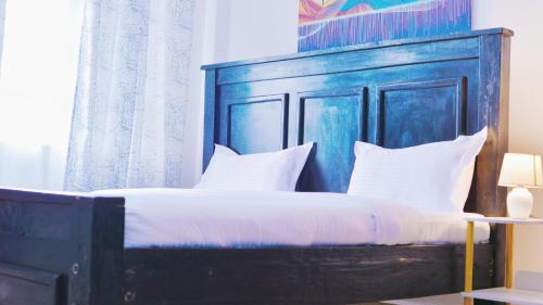 Giường trong phòng chung tại Eldo oasis