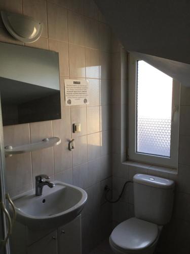 Koupelna v ubytování Dom wczasowy Max