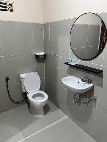 Koupelna v ubytování Helau beach krui