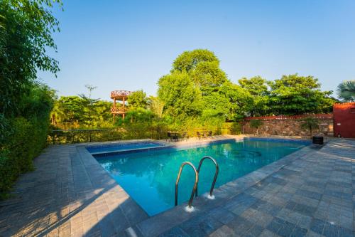 Hồ bơi trong/gần The Saipura Bagh Resort-Jaipur
