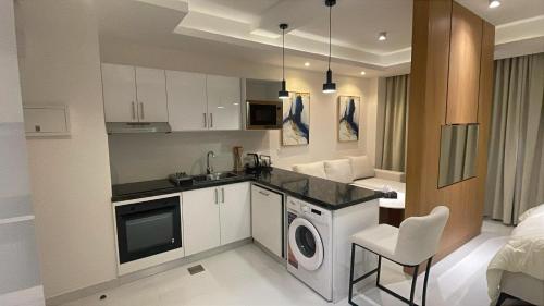 Η κουζίνα ή μικρή κουζίνα στο Lamar Residences