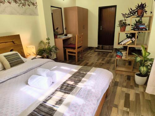 Katil atau katil-katil dalam bilik di Tanani Newa Home Family Combo