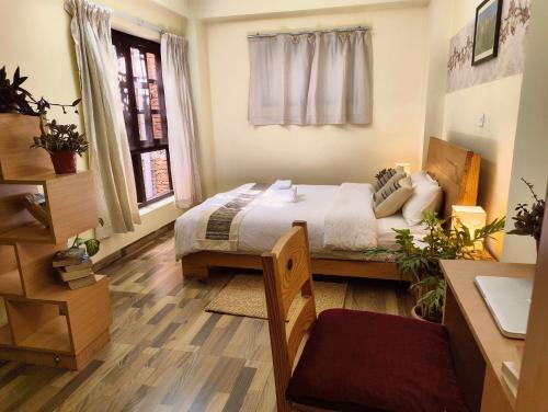 Katil atau katil-katil dalam bilik di Tanani Newa Home Family Combo