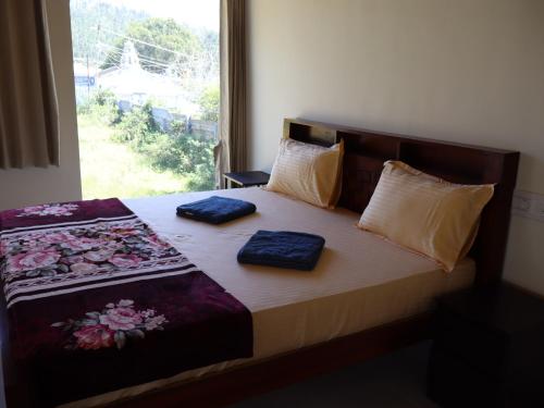 Ένα ή περισσότερα κρεβάτια σε δωμάτιο στο Drizzle Home - A Cosy Stay