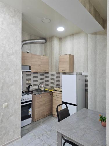 Komfort Houseにあるキッチンまたは簡易キッチン