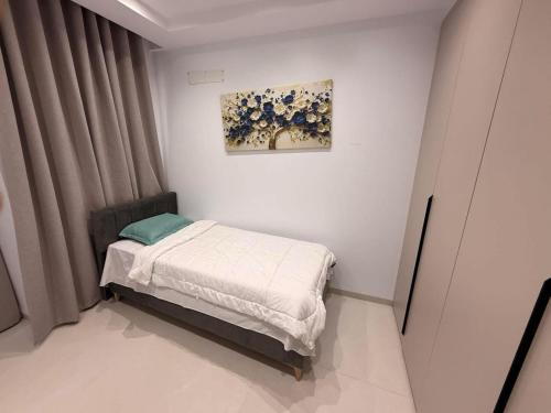 Ένα ή περισσότερα κρεβάτια σε δωμάτιο στο Appartement neuf S2