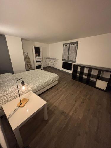 Postel nebo postele na pokoji v ubytování Le Nid du Sablard