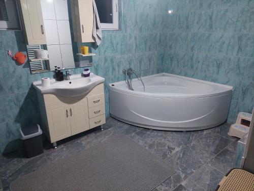 Ένα μπάνιο στο Apartman Sumatra