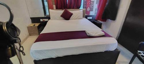 Giường trong phòng chung tại HOTEL O ENERGY SPACE