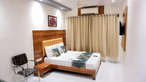 Una cama o camas en una habitación de Hotel Anuha