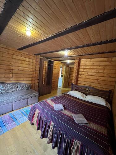 Ένα ή περισσότερα κρεβάτια σε δωμάτιο στο Ліова тиша номер - 3