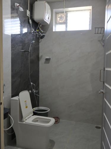 Ένα μπάνιο στο Drizzle Home - A Cosy Stay