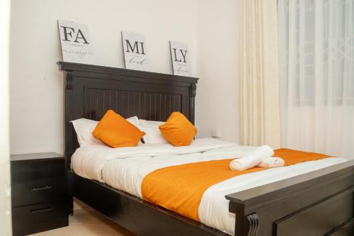 Ένα ή περισσότερα κρεβάτια σε δωμάτιο στο Urban charm Nakuru