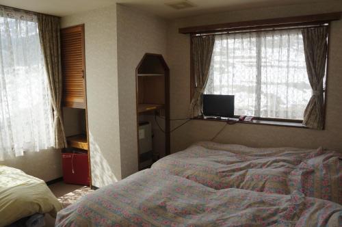 Ett rum på Hotel New Fukudaya