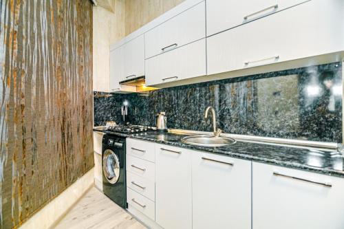 Dapur atau dapur kecil di MOXY Home
