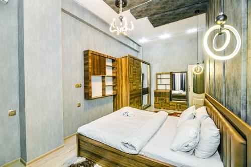 Postel nebo postele na pokoji v ubytování MOXY Home