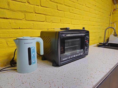 Kuchyň nebo kuchyňský kout v ubytování Traditional Wooden House