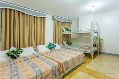 Postel nebo postele na pokoji v ubytování Yahweh's Spring Retreat and Resort