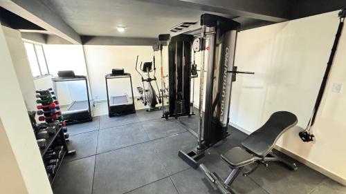 Phòng/tiện nghi tập thể dục tại Studio Moderno com automação e vista incrível