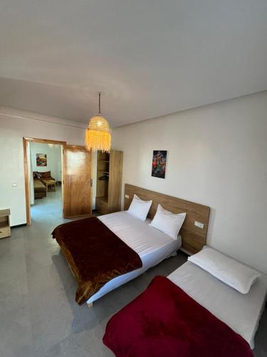 Ένα ή περισσότερα κρεβάτια σε δωμάτιο στο Atlantic view Tamraght 2