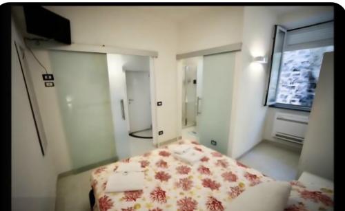 Postel nebo postele na pokoji v ubytování Ambra Apartment